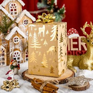 Papel de Regalo Navideño Grueso de Kraft, Reciclable, con Diseño de Reno y Árbol de Navidad en Dorado, Color Marrón - Product Image 1