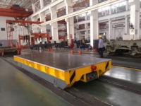 Nouvelle chariot de transfert sur rail personnalisée de 30 tonnes à batterie lithium |   Chariot plat industriel robuste pour la manutention de matériaux, télécommandé