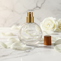 Flacon de parfum en verre cylindrique de luxe en cristal unique en gros avec vaporisateur à pompe 30 ml/20 ml pour diverses occasions