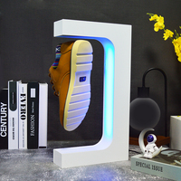 Produits nouvellement lancés Présentoir de chaussures flottant en forme de E lévitation magnétique