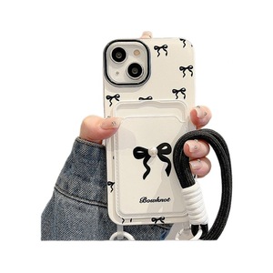 Nouvelle <span class=keywords><strong>coque</strong></span> <span class=keywords><strong>de</strong></span> <span class=keywords><strong>téléphone</strong></span> portable avec porte-cartes noir à nœud pour iPhone 15 17 Pro Max 16 14 avec cordon, <span class=keywords><strong>coque</strong></span> arrière en TPU - Product Image 5