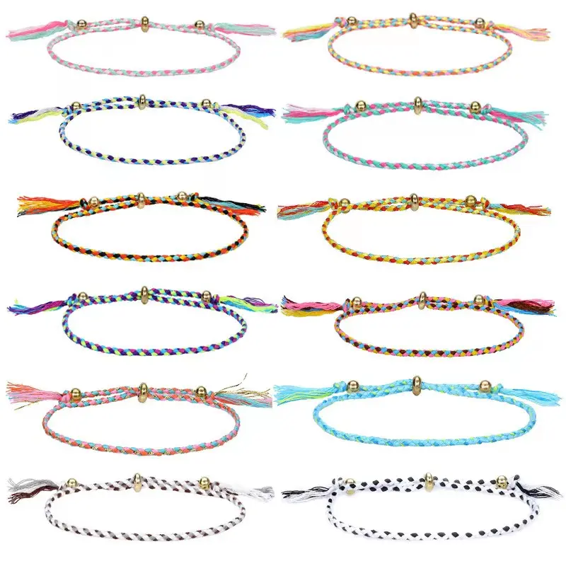 Vente en gros de différentes couleurs en stock bracelet à pompon en perles de cuivre tissées à la main en fil de coton de style simple