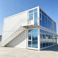 Bâtiment modulaire préfabriqué à deux étages en conteneur, avec grande façade vitrée, pour bureau, hall d'accueil de chantier de construction et espace de réception