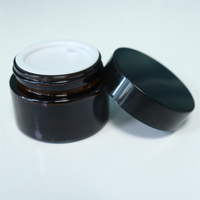 Vente en gros de pots de crème cosmétique en verre rond ambré 10g 30g 50g 100g avec couvercles noirs en plastique