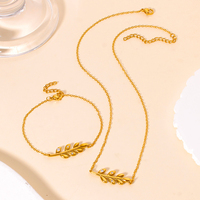 Parures de bijoux fantaisie en gros, plaqué or 18 carats, acier inoxydable, zircon, pendentif feuille, collier et bracelet pour femmes