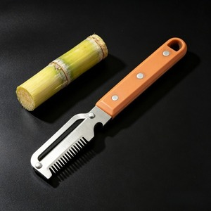 ที่ปอกอเนกประสงค์ทำจากสแตนเลสด้ามไม้สำหรับใช้ในครัวทำจากฟักทองอ้อย - Product Image 4