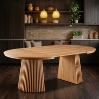 Table à manger ronde minimaliste avec plateau extensible transformable en table longue pour les réceptions