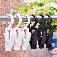 Crochets suspendus pivotants en plastique super résistants Clips pour serviettes de plage pour rideaux Clips à linge pivotants pour chapeaux pantalons serviettes chaussettes
