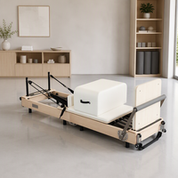 Reformer de Pilates pliable en bois d'érable avec fonctions réglables et logo personnalisé pour les entraînements à domicile