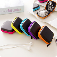 Vente en gros d'étuis pour écouteurs Bluetooth portables, petits, carrés, personnalisés, avec rangement pour câble de données, en EVA léger, boîte de transport noire/orange