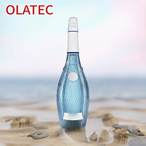 Bouteille de vin mousseux OLATEC de luxe en verre texturé bleu avec motif ondulé et emballage haut de gamme - Product Image 1