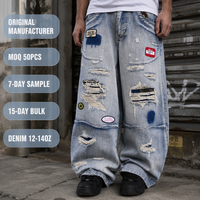 Vaqueros anchos de mezclilla azul claro personalizados de 13 oz con lavado ácido, efecto desgastado, rasgados, con múltiples parches y de corte oversize para hombre