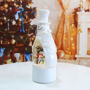 ของตกแต่งคริสต์มาสขายดี โคมไฟ LED รูปตุ๊กตาหิมะ 1 ลิตร แสงวอร์มไวท์ พร้อมลูกโลกหิมะใส่น้ำ สำหรับตกแต่งไฟประดับ - Product Image 4