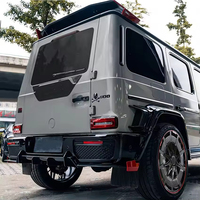 Diffuseur de pare-chocs arrière en fibre de carbone véritable style B900 compatible avec Mercedes-Benz Classe G G63 G500 W463A W464 2019-2024