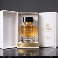 Bouteille de parfum en verre ronde large de 100 ml avec impression de logo doré personnalisée, vaporisateur à fine brume, bouchon de parfum noir mat