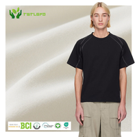 T-shirt ample en coton biologique 100% tricoté, brodé, anti-plis, coupe carrée, personnalisable avec impression et surpiqûres contrastées