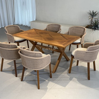 Table de jardin en bois avec plateau rectangulaire et pieds croisés pour terrasse extérieure