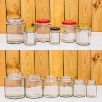 Pot en verre hexagonal transparent de qualité supérieure, résistant aux hautes températures, pour confiture, sauce chili, pâte de citron, miel, aliments, avec couvercles
