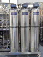 Système de traitement d'eau par osmose inverse en deux étapes pour la production d'eau pure, l'eau de mer et le lavage de voitures