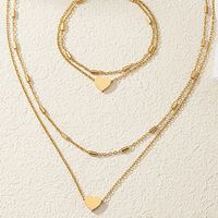 Ensemble collier et bracelet double couche en acier inoxydable plaqué or 18 carats, pendentif cœur minimaliste tendance, unisexe, pour mariage et fête