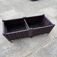 Jardinière rectangulaire en plastique imitation rotin PP, lit de jardin surélevé en osier tressé marron, léger, avec roulettes, trous de drainage et système d'arrosage automatique