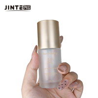 Flacon pompe en verre rose givré vide avec pompe dorée pour sérum visage et soins de la peau