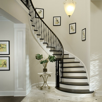 Escalier courbé en métal style américain populaire avec marches en bois massif noyer pour intérieur