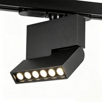 Fournisseur de solutions d'éclairage hôtelier : Projecteur LED sur rail orientable avec grille coulissante