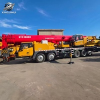 Promotion : Grue mobile Sany STC1000C 100 tonnes à flèche télescopique hydraulique pour levage de chantier, faible nombre d'heures, livraison rapide