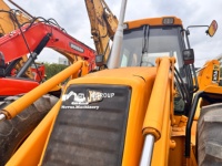 Chargeuse-pelleteuse JCB 4CX d'occasion, 4x4, roues égales, machine de terrassement robuste