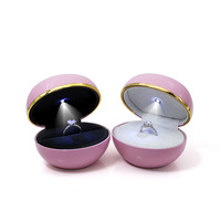 Boucles d'oreilles rondes pour pendentif, boîte de bijoux en plastique, cadeau, demande en lumière LED, livraison gratuite