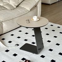 Canapé d'angle moderne italien minimaliste et circulaire Selle en cuir Bord en acier inoxydable Designer Balcon Petite table basse