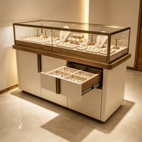Vitrine de luxe pour bijoux en verre trempé avec éclairage LED et armoires de rangement pour bijouterie