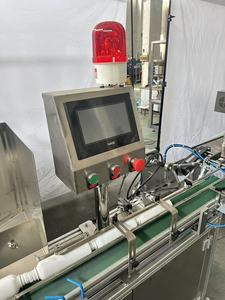 Machine de remplissage et d'emballage automatique pour huile moteur et graisse, 1 gramme, avec scellage central à l'azote pour flacons PP-4, pour rouges à lèvres bicolores - Product Image 3