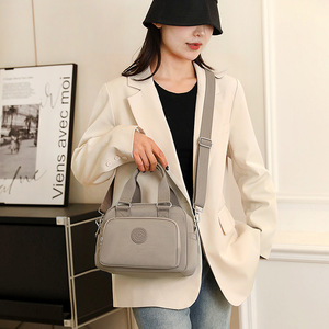 Women's Water-Resistant Oxford Cloth Multi-Compartment Canvas Tote Bag Versatile Crossbody Shoulder and Travel Messenger Bag - Product Image 4