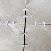 Système d'entretoises pour carrelage en plastique moderne TAURUS, 1 mm, accessoires de nivellement réutilisables pour le revêtement de sol, entretoises croisées pour carrelage, certifié CE/ROHS