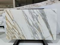 Marbre Calacatta Gold, pierre veinée de luxe pour la décoration intérieure haut de gamme, comptoir d'îlot de cuisine en marbre naturel