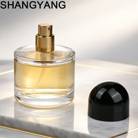 Flacon de parfum rond personnalisé de 50 ml avec pulvérisateur à pompe, flacon de parfum en verre élégant et luxueux à fond épais avec boîte