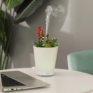 Phổ biến độc đáo điện trắng gốm nồi hình dạng tinh dầu khuếch tán với 7 <span class=keywords><strong>Led</strong></span> và hẹn giờ cho nhà - Product Image 1