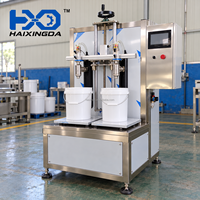 Machine de remplissage d'huile pour grands seaux, machine de remplissage semi-automatique de bouteilles pour la production d'huile de cuisson, de lubrifiant et d'huile comestible