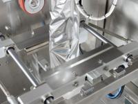 Machine d'emballage alimentaire verticale à pesage multi-têtes haute vitesse pour sachets de snacks de café torréfié et dattes séchées