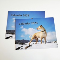 Cetak Kalender Dinding Bulanan Anak Anjing dengan Jilid Jahit Murah