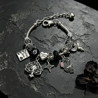 Bracelet Fanhua Jewelry, best-seller TikTok, en acier inoxydable plaqué or, étanche, avec motifs Corbeau, Rose, Pique et Boule 8