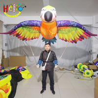 Costume de marche gonflable de défilé marionnette gonflable d'oiseau perroquet gonflable sauter aire de jeux de marionnettes d'oiseaux
