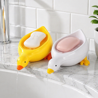 Jolie mini-savonnière en plastique drainable en forme de canard, plateau à savon à écoulement d'eau sans perçage, accessoires pour salle de bain et lavabo
