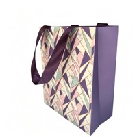 Sac en papier pour vêtements de boutique, carton blanc, imprimé offset avec dorure à chaud et gaufrage, sac fourre-tout haut de gamme