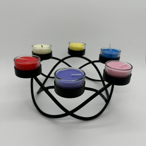 Bougeoir à bougie chauffe-plat rond écologique Beau candélabre en fer métallique unique avec design en relief pour la décoration de la maison - Product Image 1