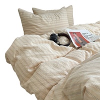 Parure de lit 4 pièces en coton 100% teint en fil, lavée, antistatique, rayée, 600 fils/cm², design minimaliste de style japonais, pour un sommeil pur.