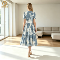 Fabricant chinois de vêtements féminins haut de gamme, vente en gros de jupes de plage plissées, jupes imprimées, jupes longues à col en V, directement de l'usine