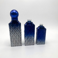 Flacon de parfum de luxe en verre dégradé bleu-gris avec texture découpée 10ml/15ml/20ml, flacon pulvérisateur rechargeable